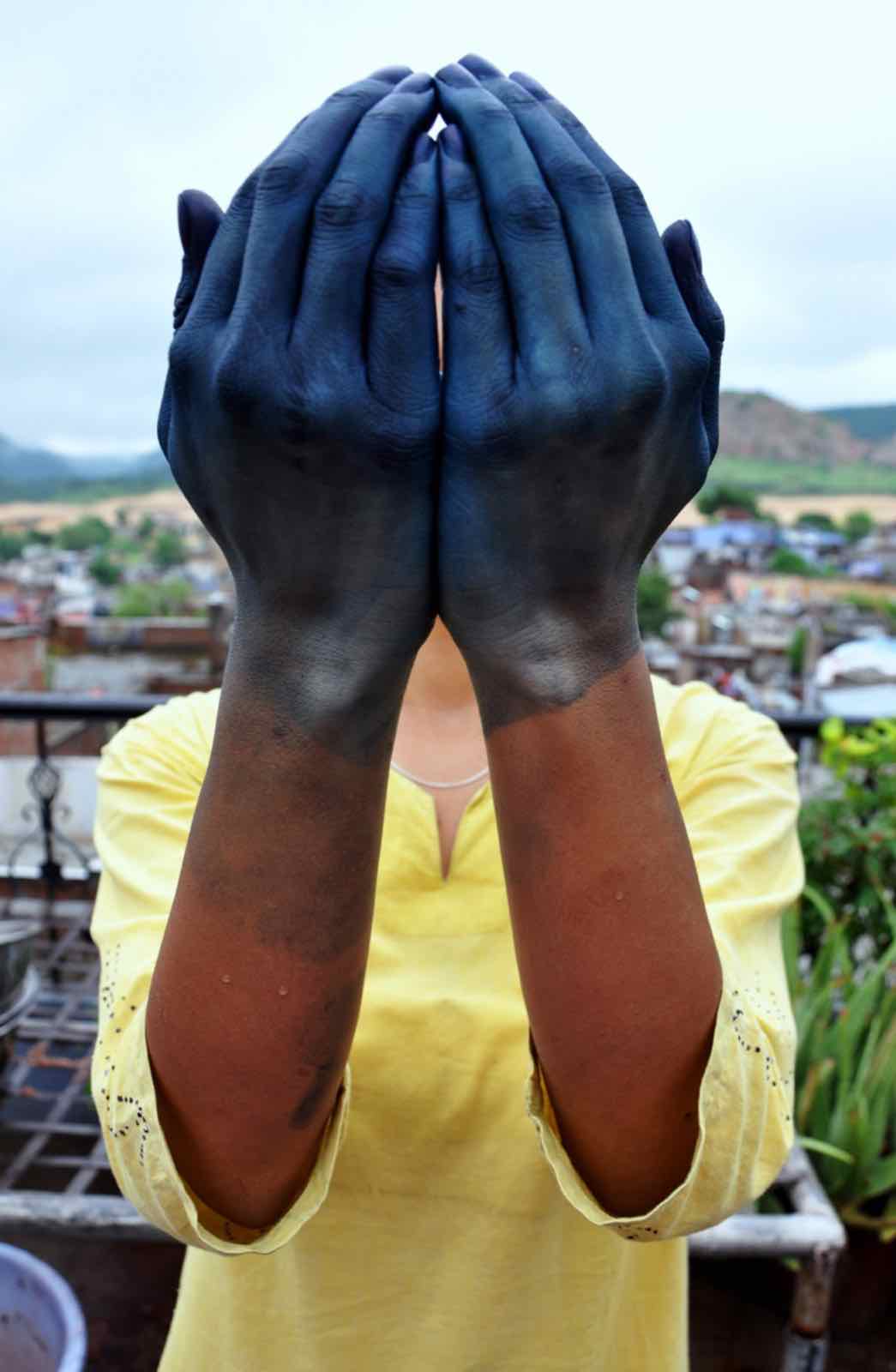 Hands stained with indigo dye