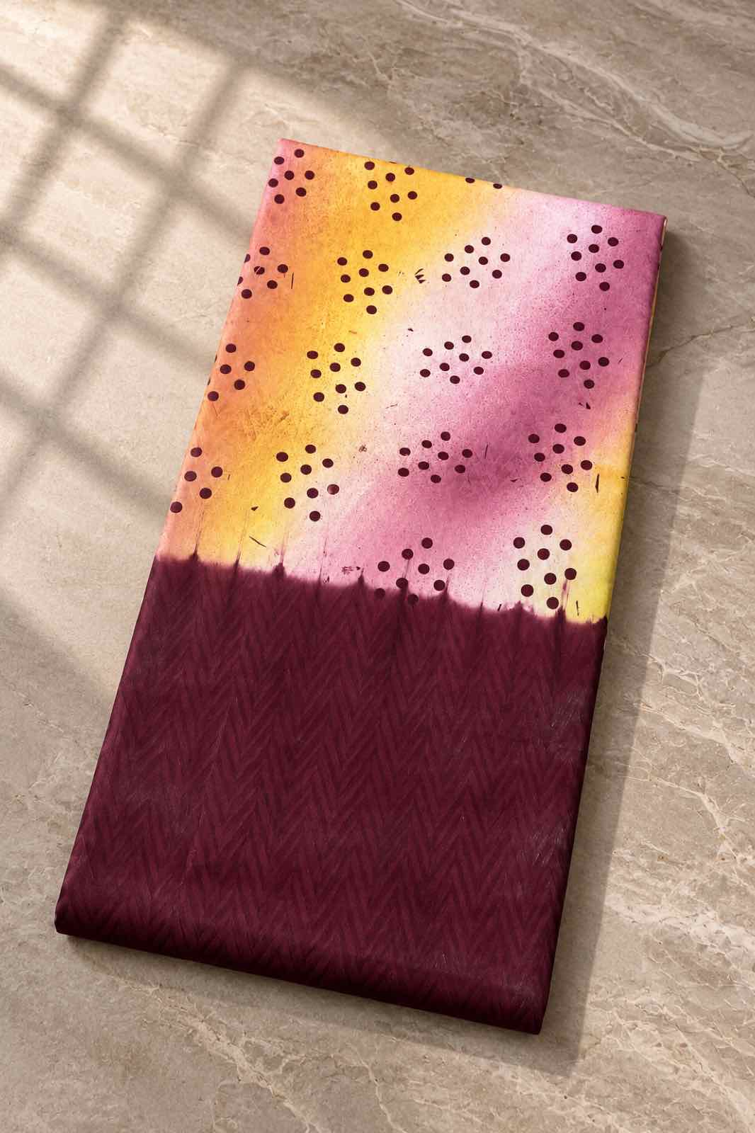 A Rini design, gold and pink in a dotted ombre pattern