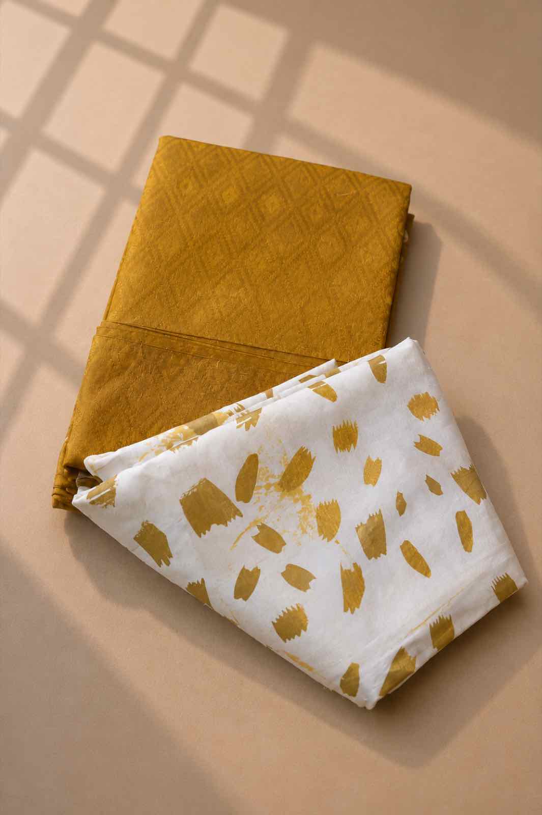 A Rini design, deep teal with a floral and geometric pattern